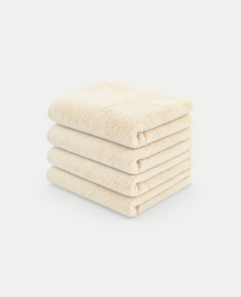 Guest towel zero-twist cotton 30x30 cm (4 pcs) | Cream Stapel van vier zachte beige handdoeken van DOUXE